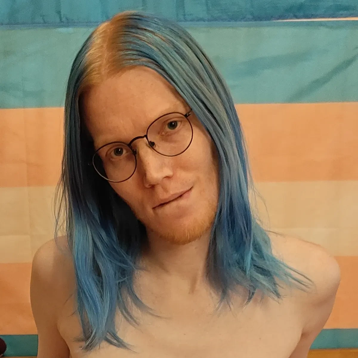 my face in front of a trans flag